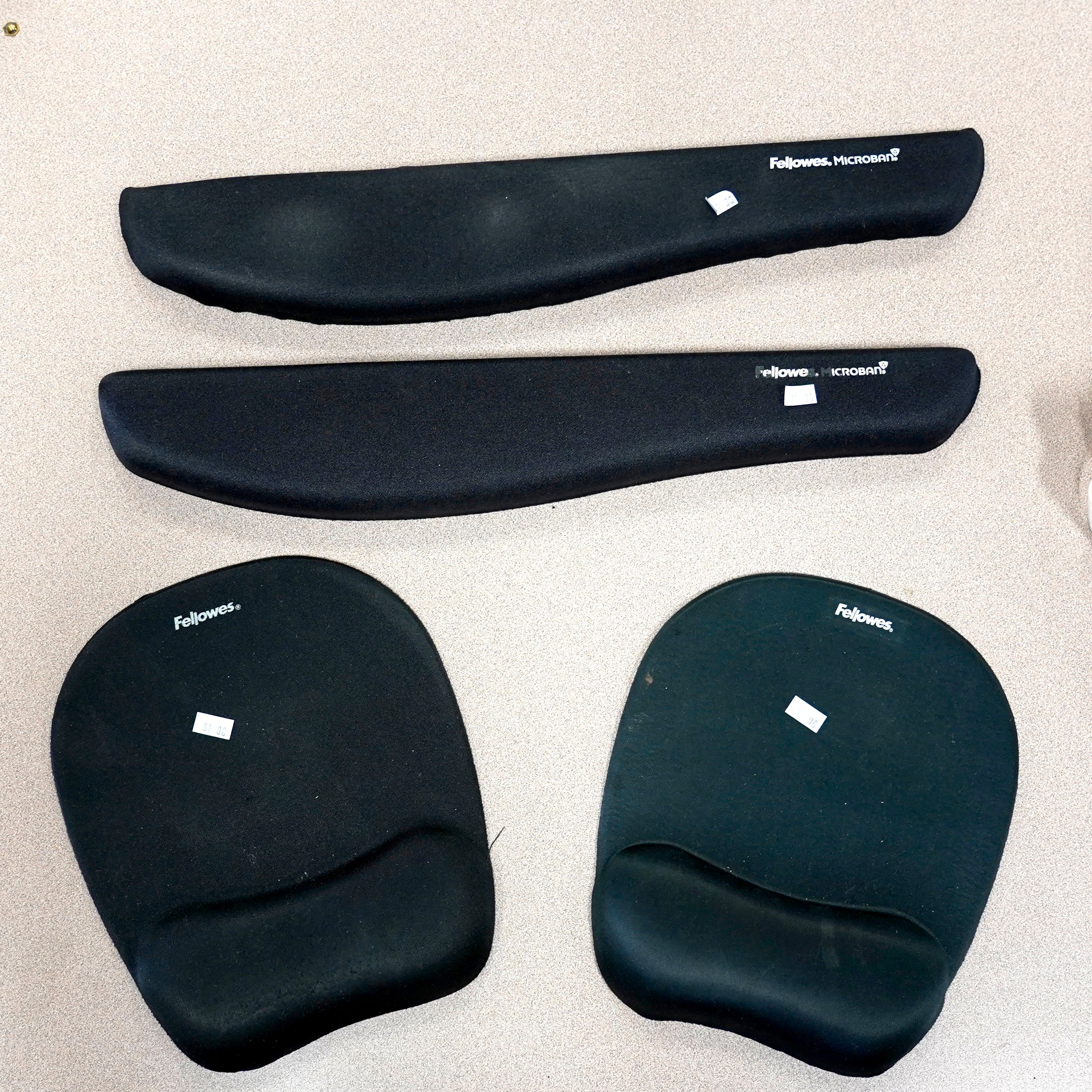 Fellowes Memory Foam Mouse Pad/Wrist Rest and Fellowes PlushTouch Microban Wrist Rest.