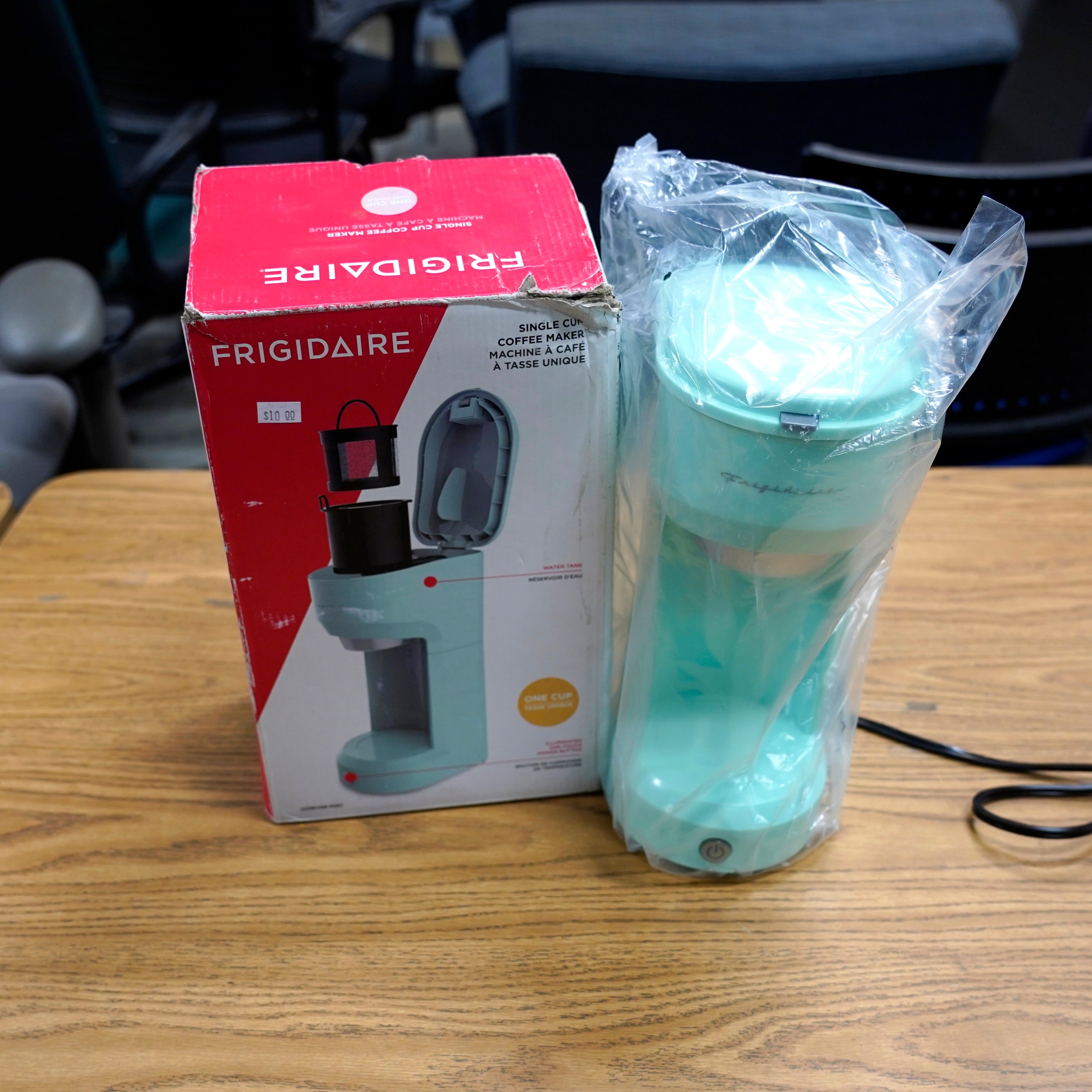 Spend $10 on a coffee maker, not a coffee.