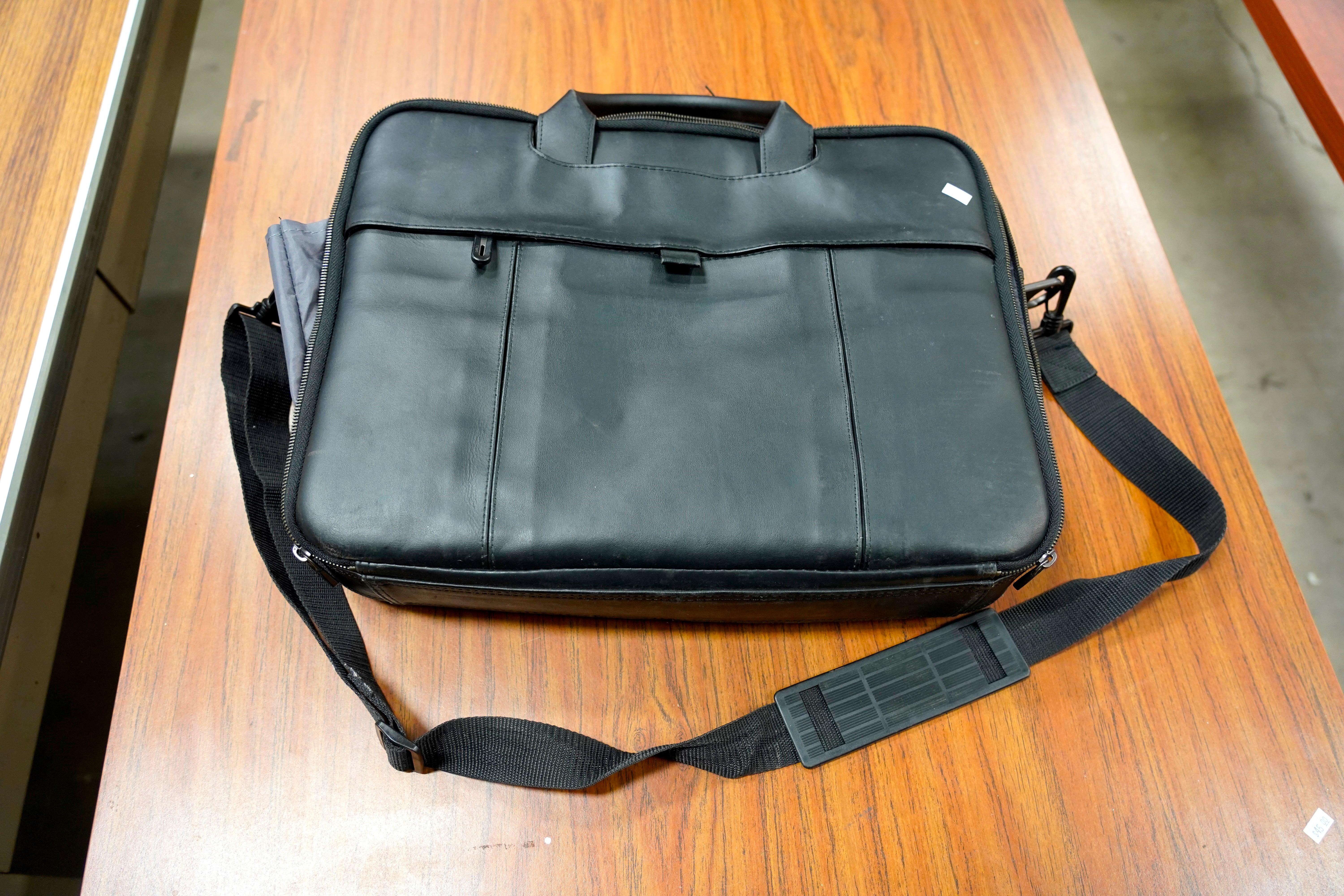 Black leather messenger bag