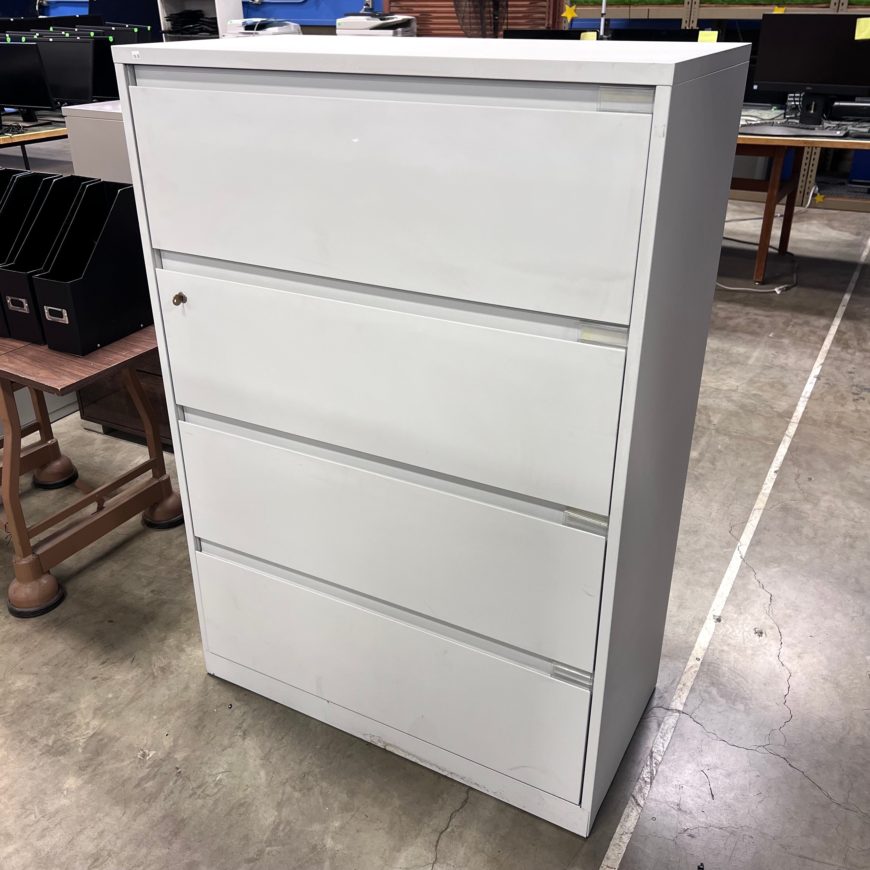 Gray Metal Four-Drawer Lateral Filing Cabinet With Lock and Key