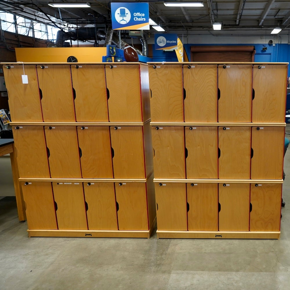 2 sets of wooden lockers with 12 lockers in each set and with keys.