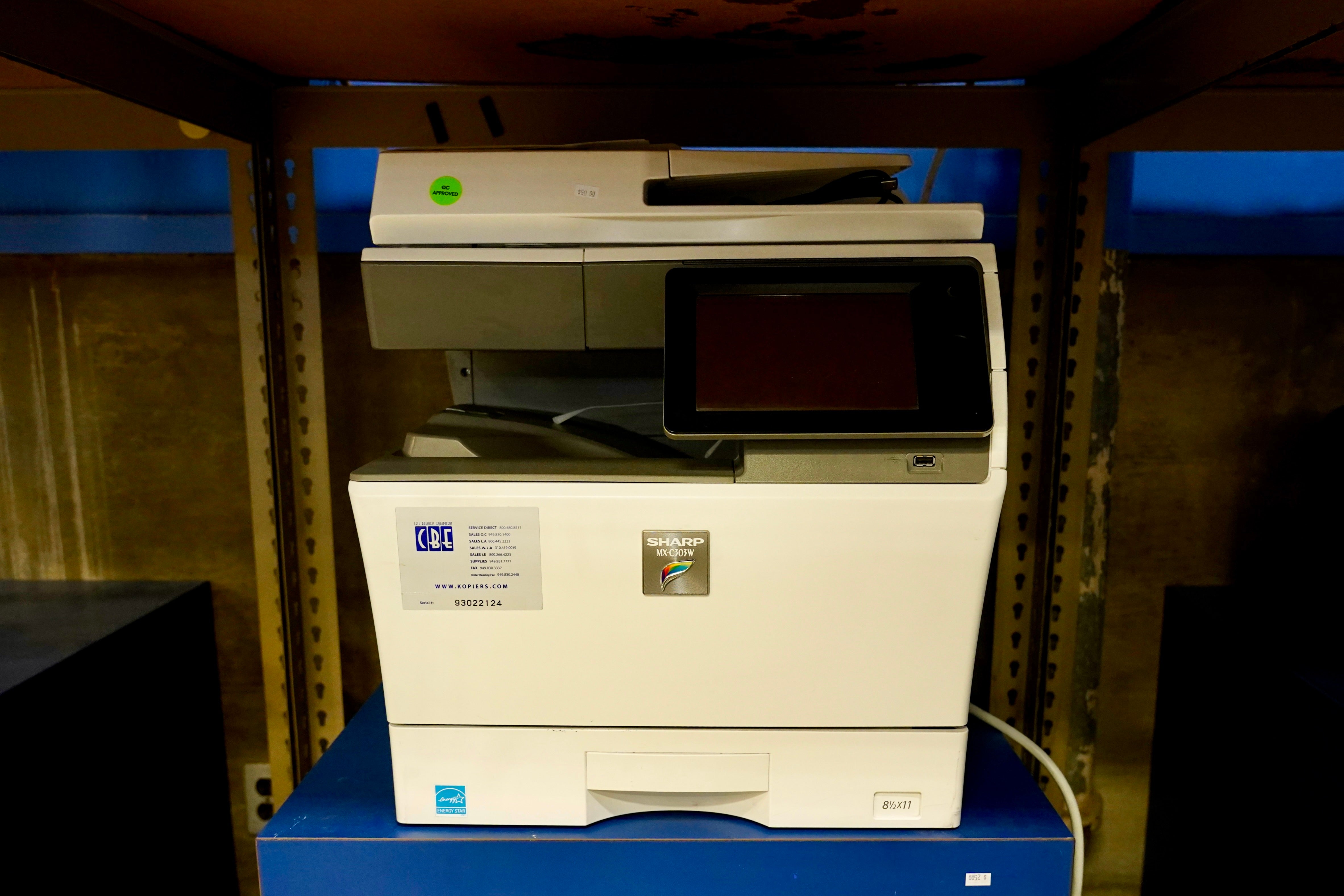 Sharp MX-C303W color printer.