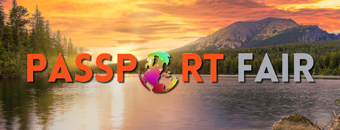 "Passport Fair" on a scene of a lake with mountains and trees at sunset.