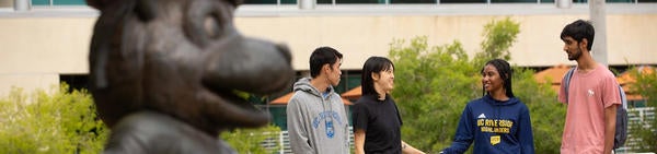 Students with University Clothing