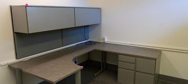 L-shaped desk with upper cabinets