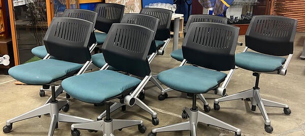 Green rolling office chairs