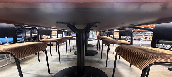 underneath long conference table with chairs