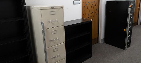 three cabinets of varying heights