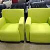 Bright green single-seater cloth chairs.