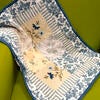 Blue and cream patchwork throw